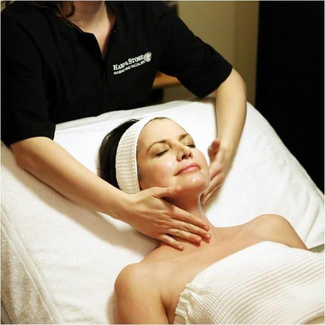 Hand &amp; Stone Massage and Facial Spa Logo