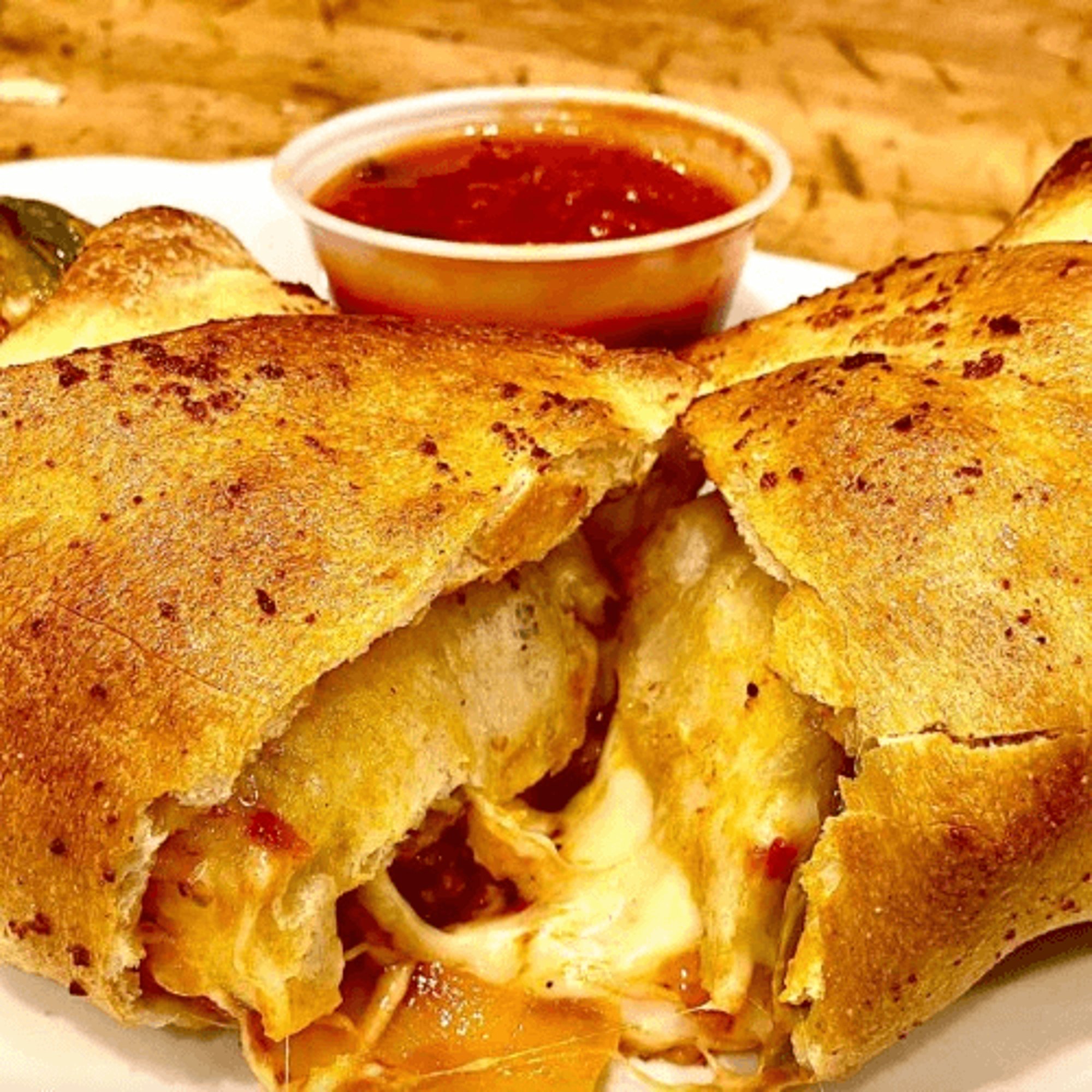 SAUSAGE & PEPPERS STROMBOLI REG