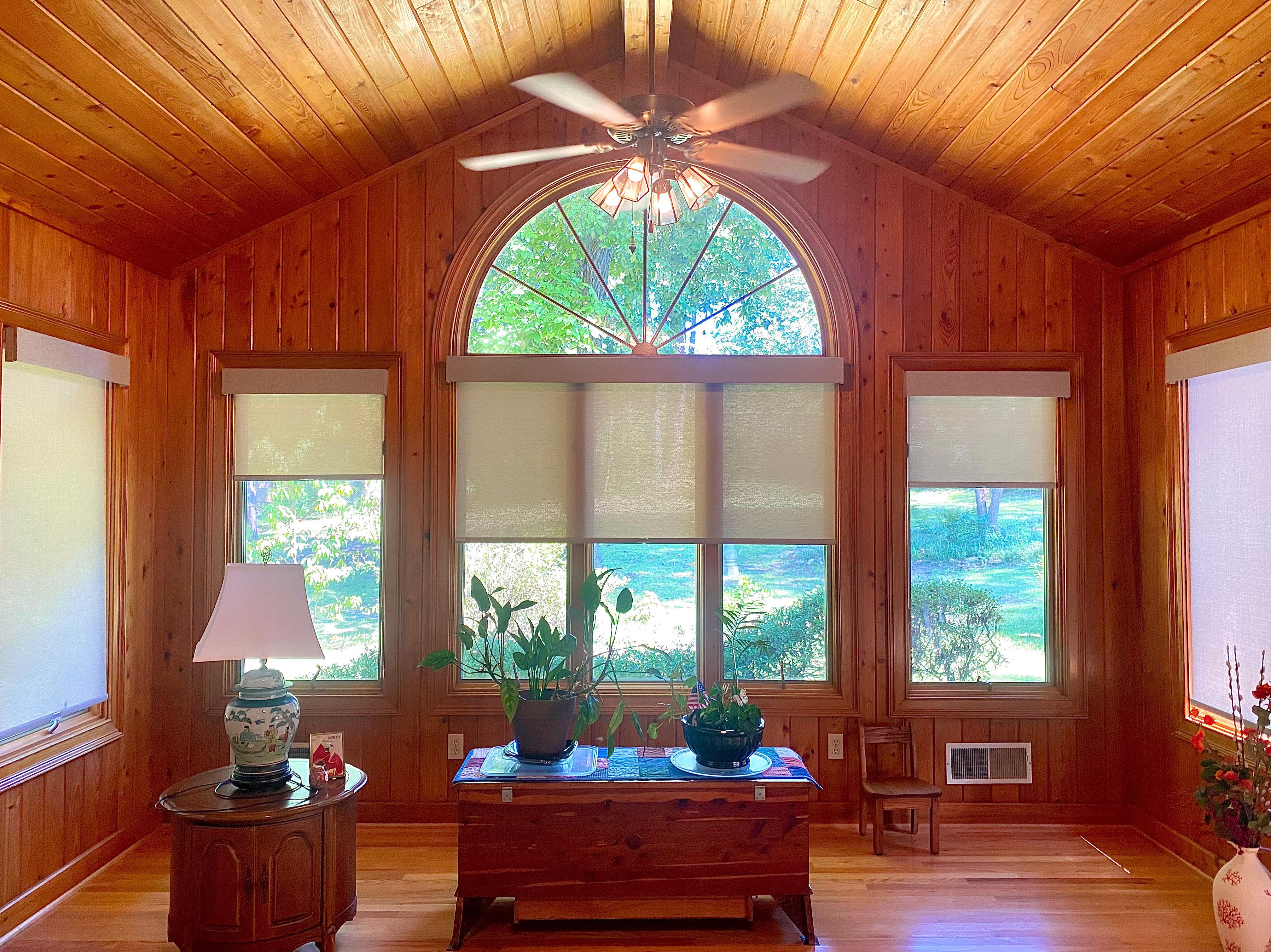 Roller Shades are a great addition to this large sunroom! Customer states their electric bill dropped over $80 after install!