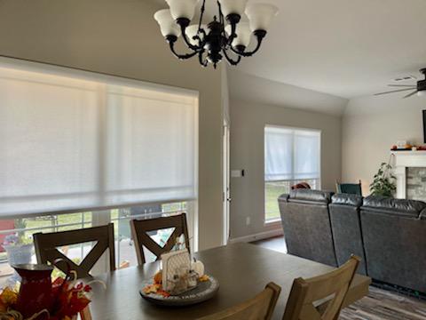 Installing Shades, and wanting privacy, shouldn't mean compromising on natural light! Our large selection of Roller Shades, like the ones in this dining room in Fort Gibson, OK block the sun's glare, but allow daylight to seep in and brighten up the room.  BudgetBlindsOwasso  FortGibsonOK  RollerSha