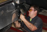 Mechanics at Bauer Built repair wheel end work for commercial fleet customers. Mechanics at Bauer Built repair wheel end work for commercial fleet customers.