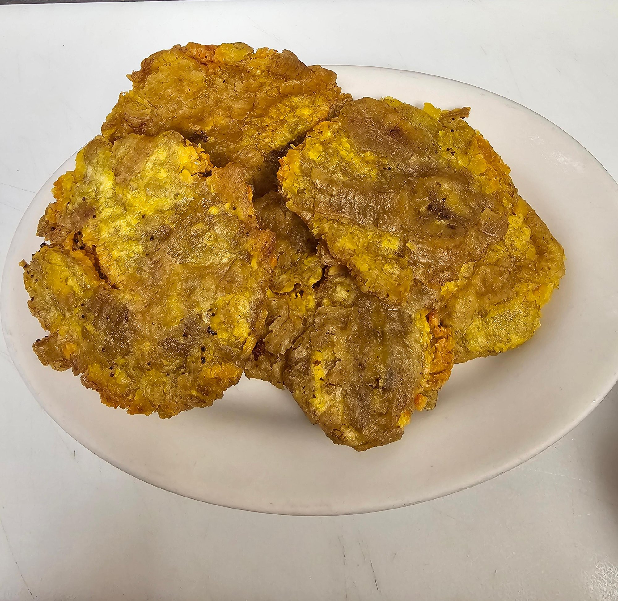 Tostones (Seasoned Green Plantain Chips)