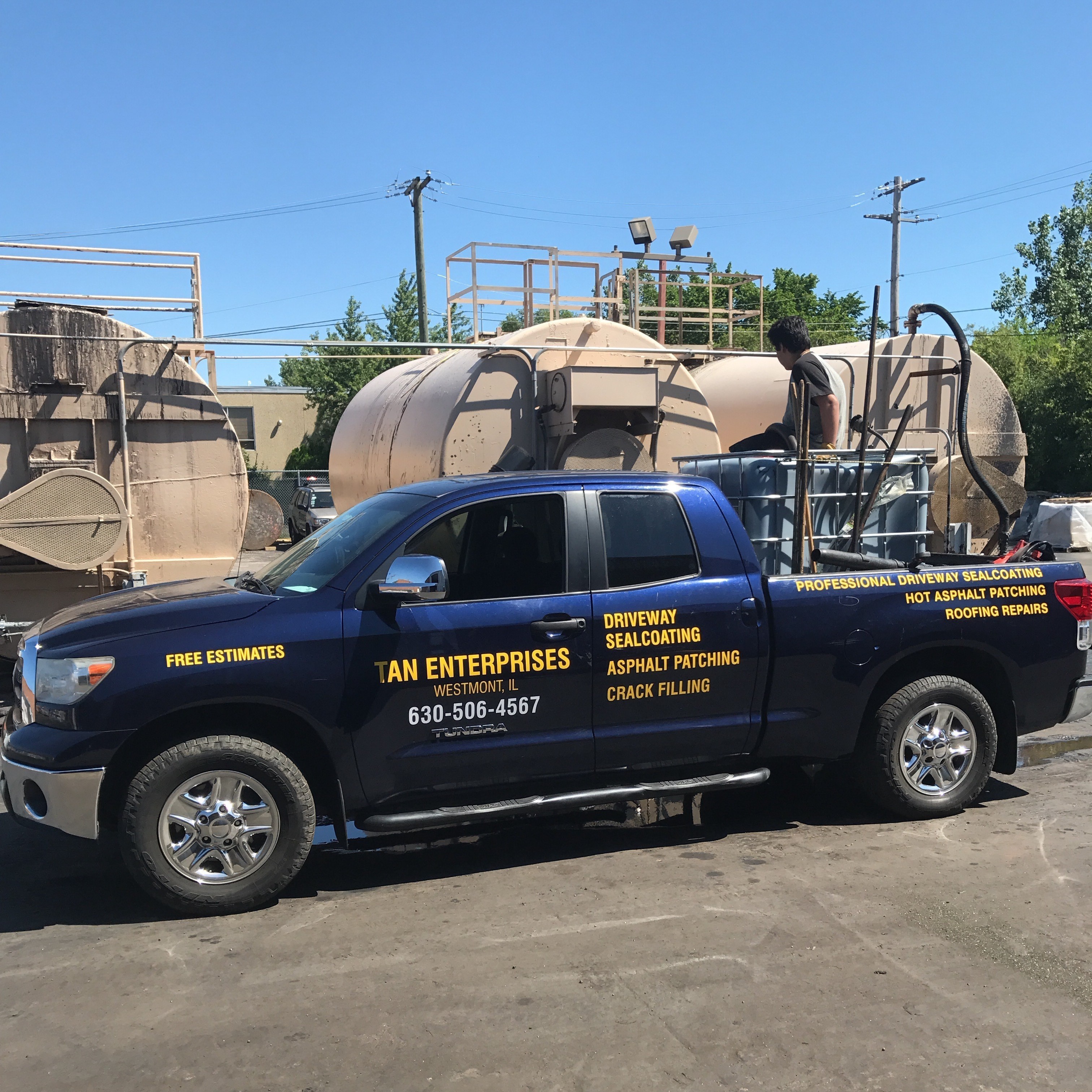 Tan drive way sealcoating Logo