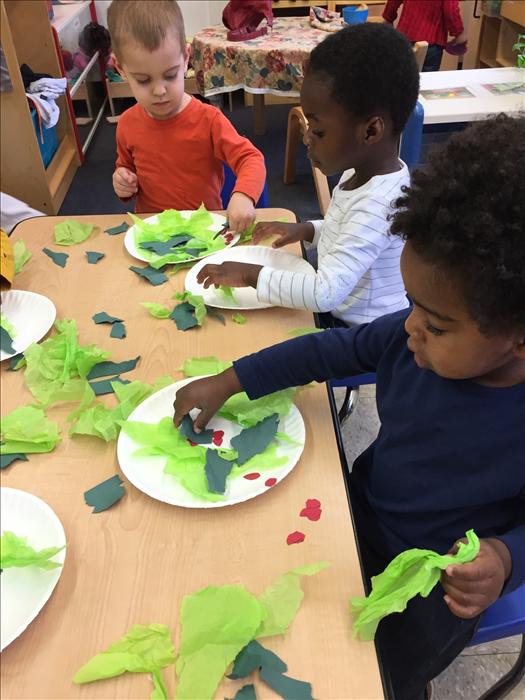 Discovery Preschool tossing their healthy salad