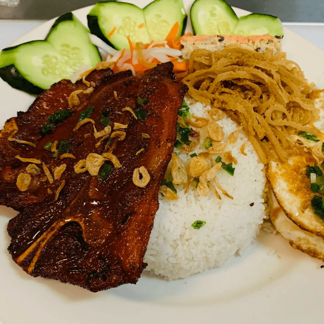 65. Đặc Biệt - Grilled Pork Chop, shredded Pork Skin, Pork Loaf, & 2 Eggs
