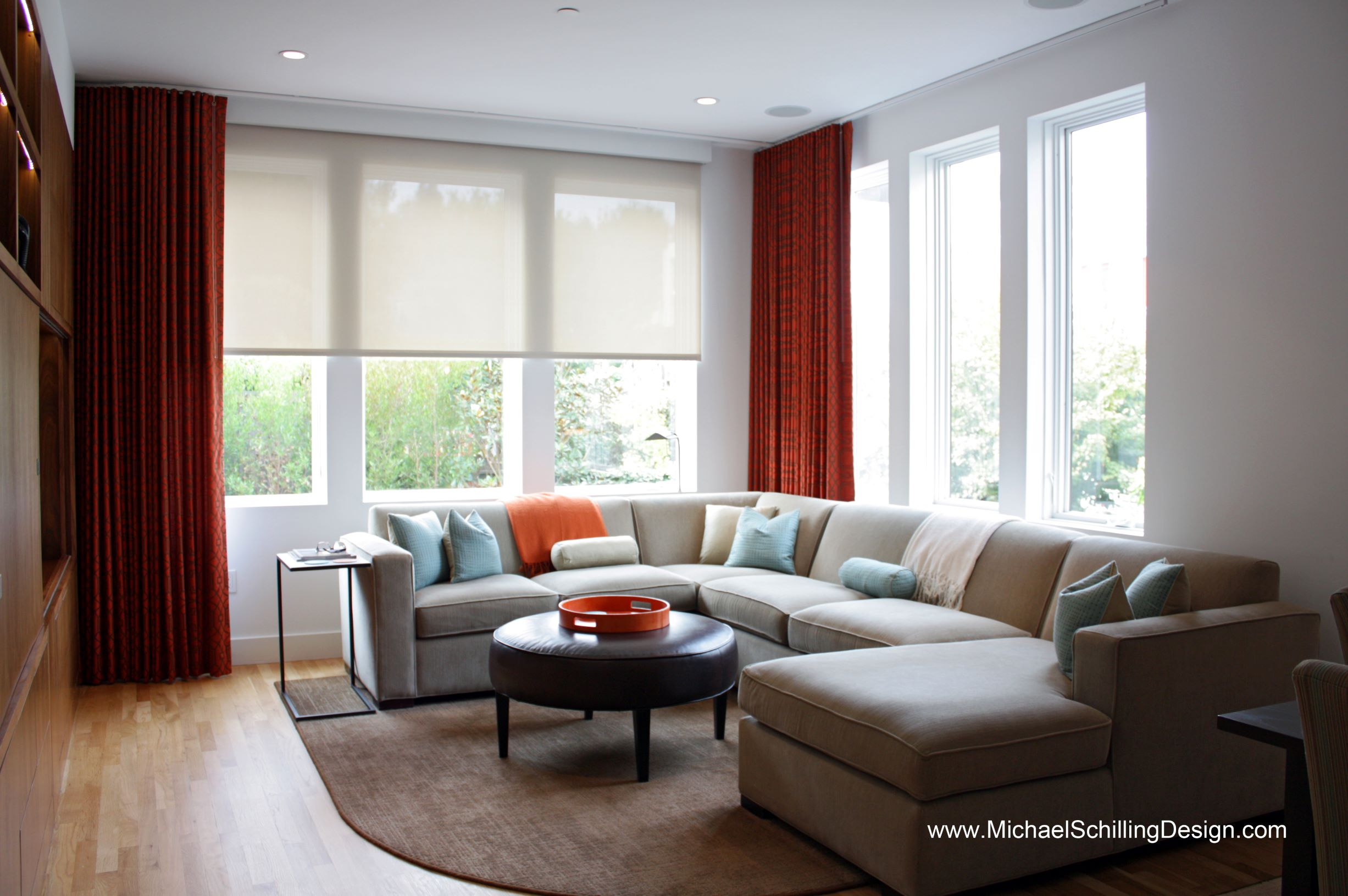 Lutron automated shades with designer draperies finish off any room with style.