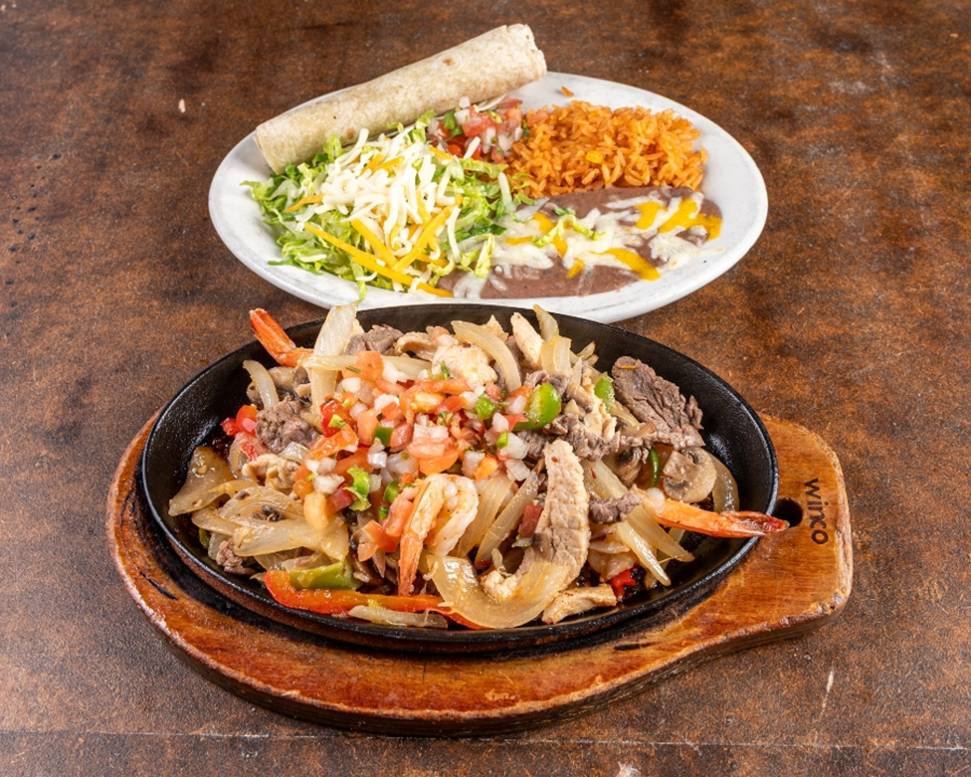 Chicken, Steak And Shrimp Fajitas