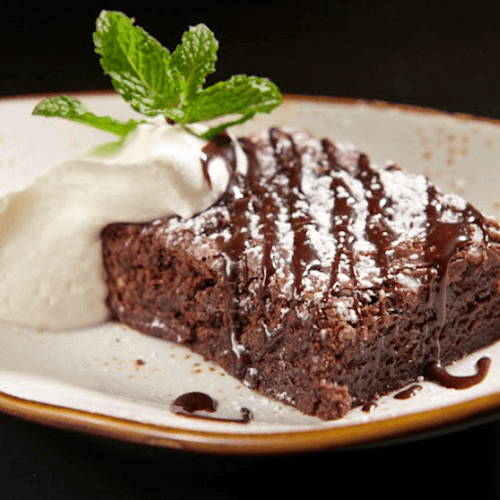 Chocolate fudge brownie, whipped cream