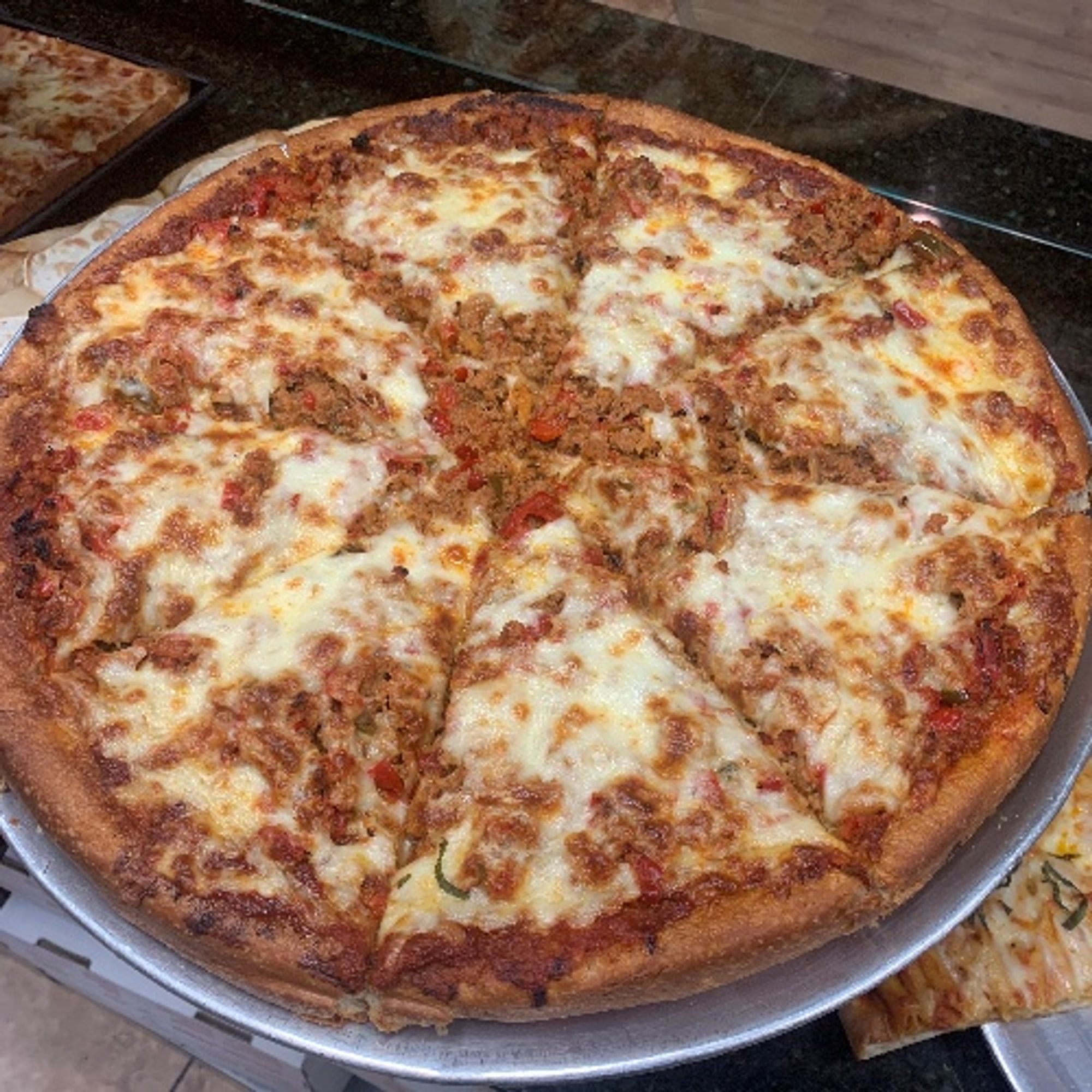 Sausage & Pepper deep dish pizza