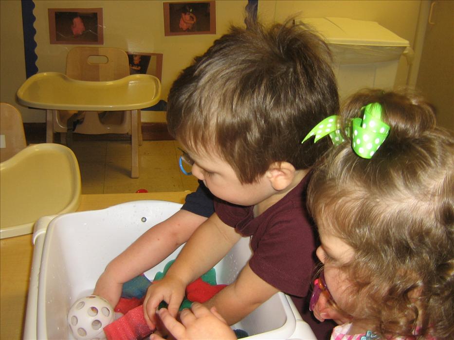 Toddlers will show increased ability to control their environments and movements! Water play is a great way to encourage this.