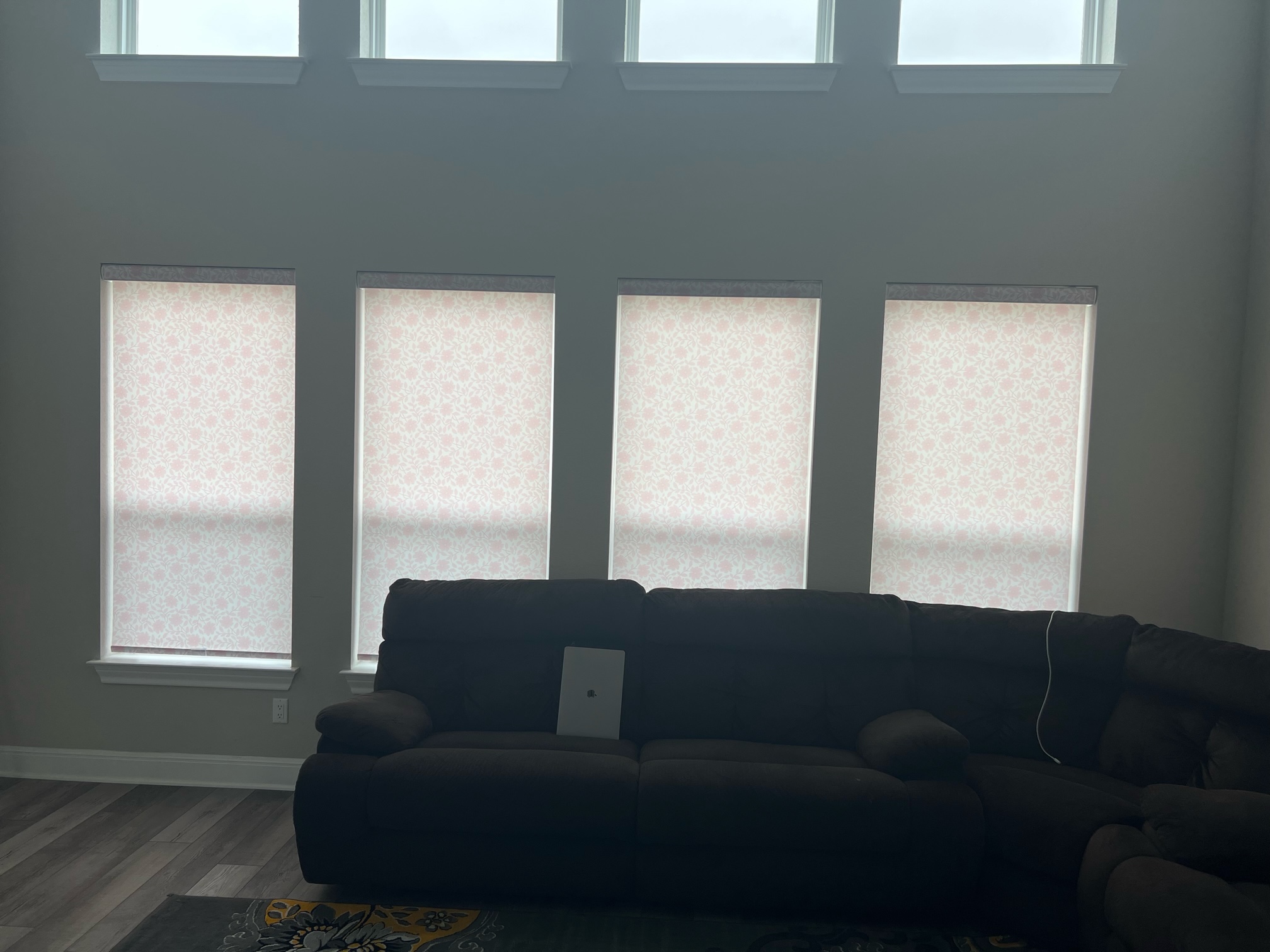 Light filtering roller shade for a family room in Leanderwith designer fabric for family room in