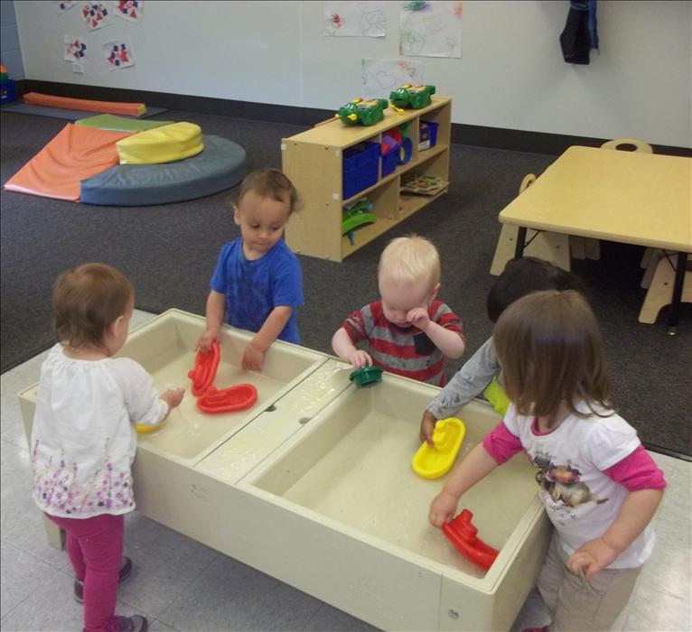 Toddlers are just learning how to create relationships and play with others.  Through guidance and encouragement, we help toddlers feel safe while participating as part of a larger classroom community.