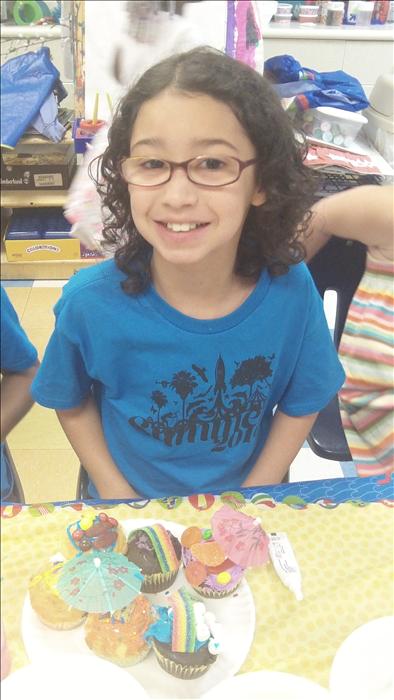 Julia decorated her cupcakes for our friendly cupcake war with Shelton KinderCare.