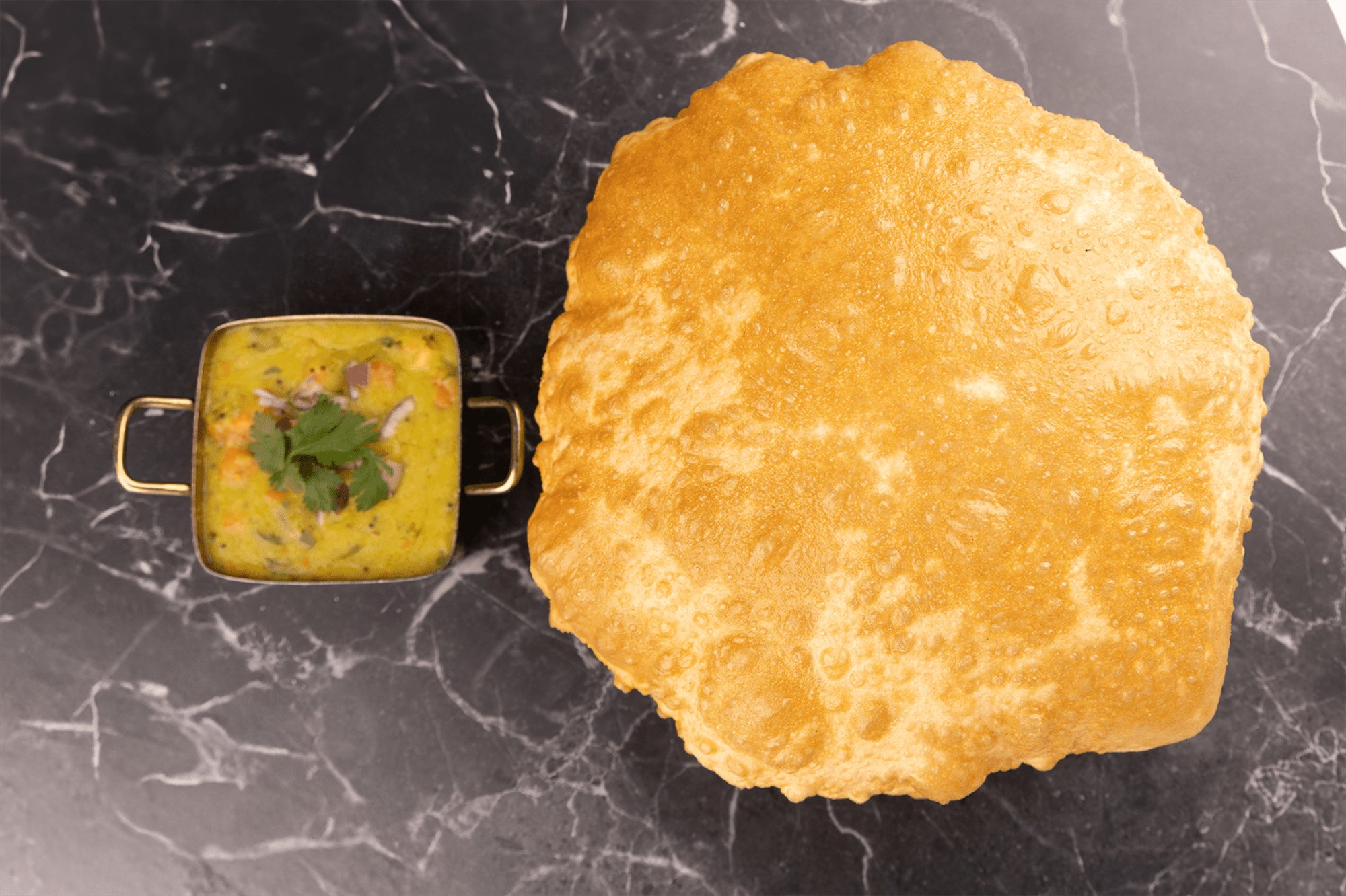 Baturas Aloo Tomato Curry
