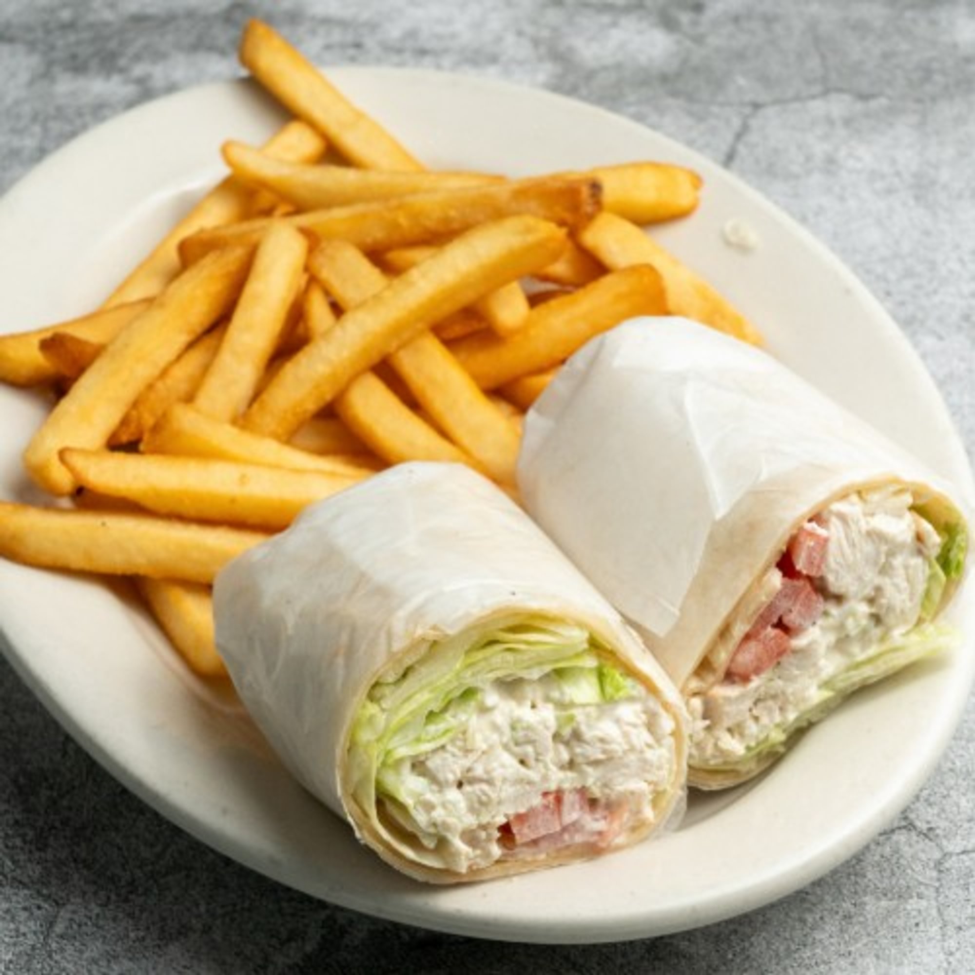 Chicken Salad Wrap Served with a Side