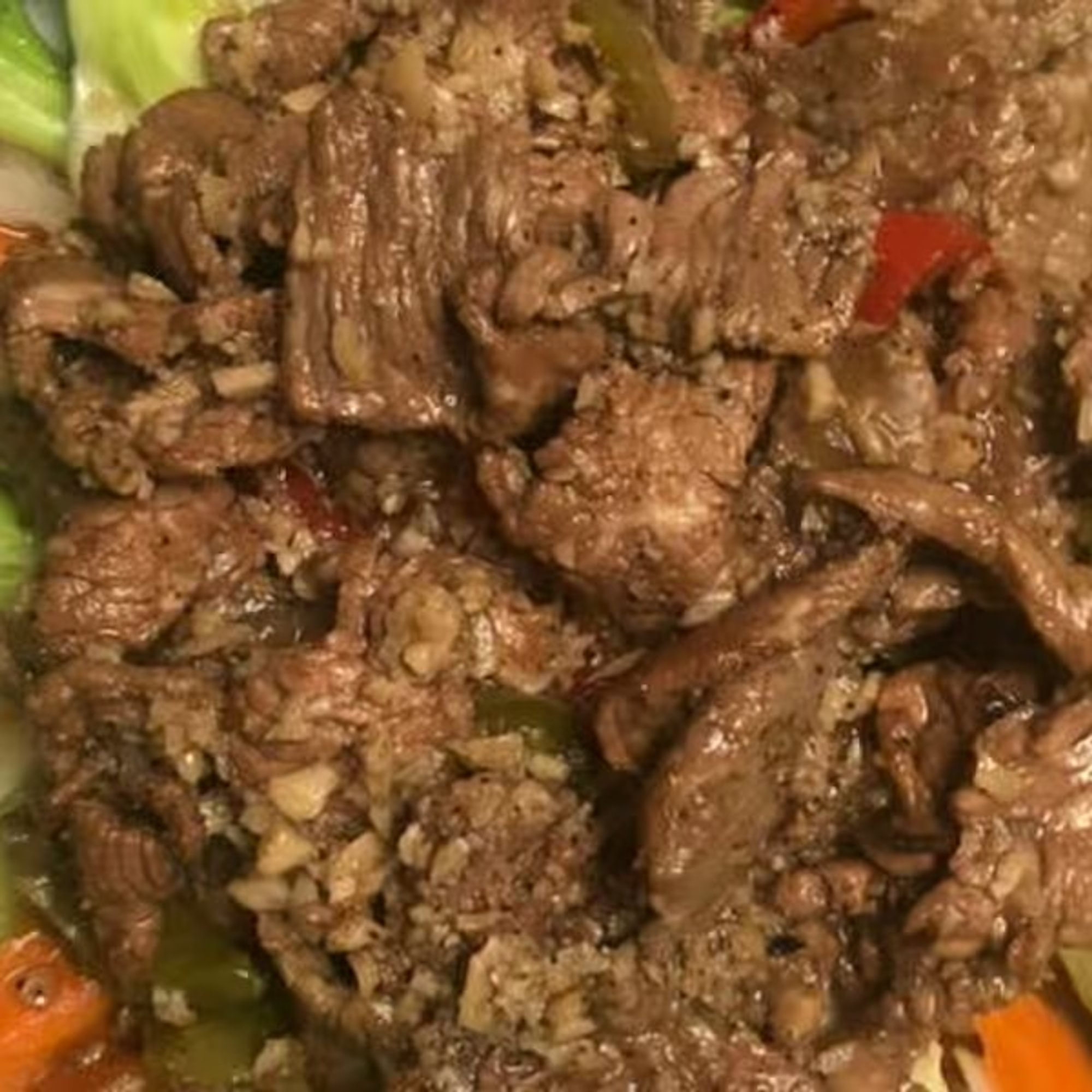 P9. *Pad Kra Tuim (Spicy Garlic)