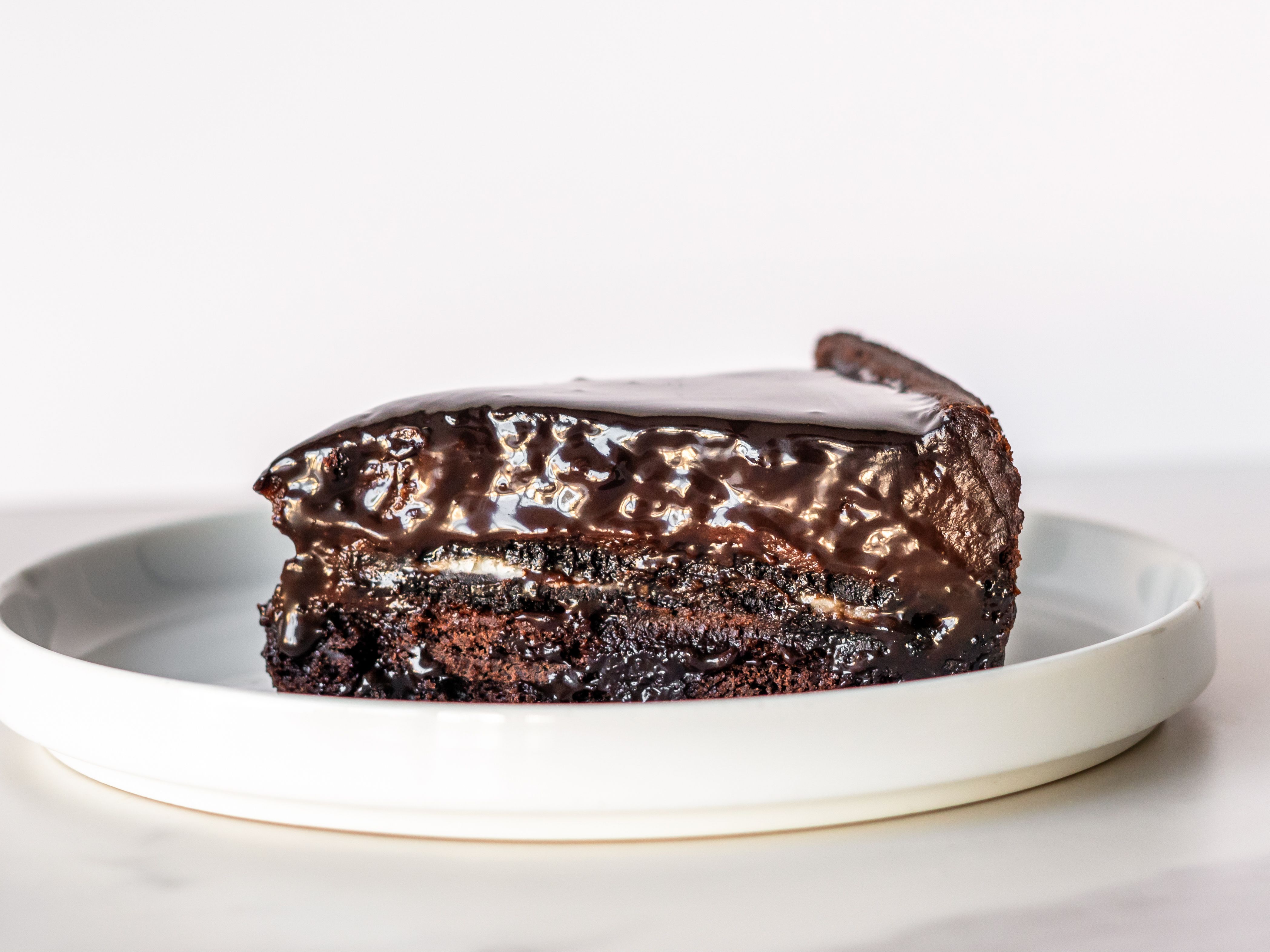 Triple Chocolate Oreo Cheesecake Slice