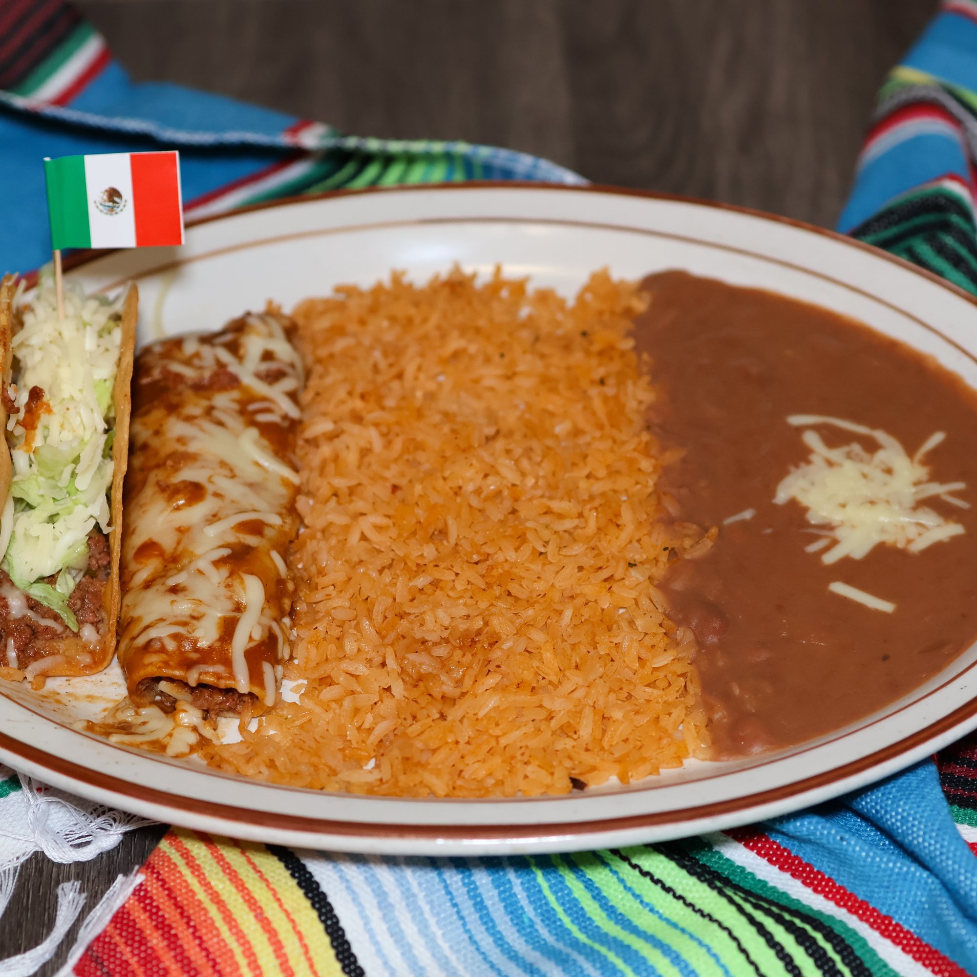 6. Beef Enchilada, Taco, Rice & Beans