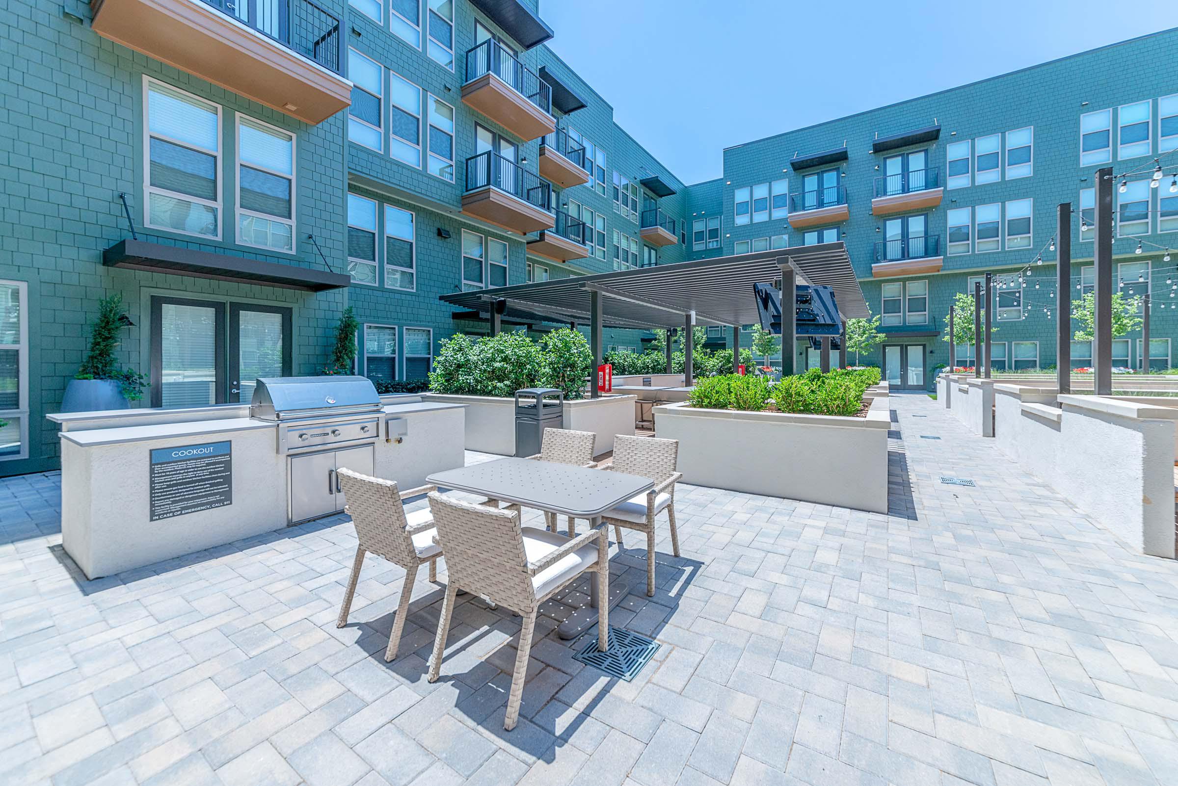 Courtyard grill area with seating