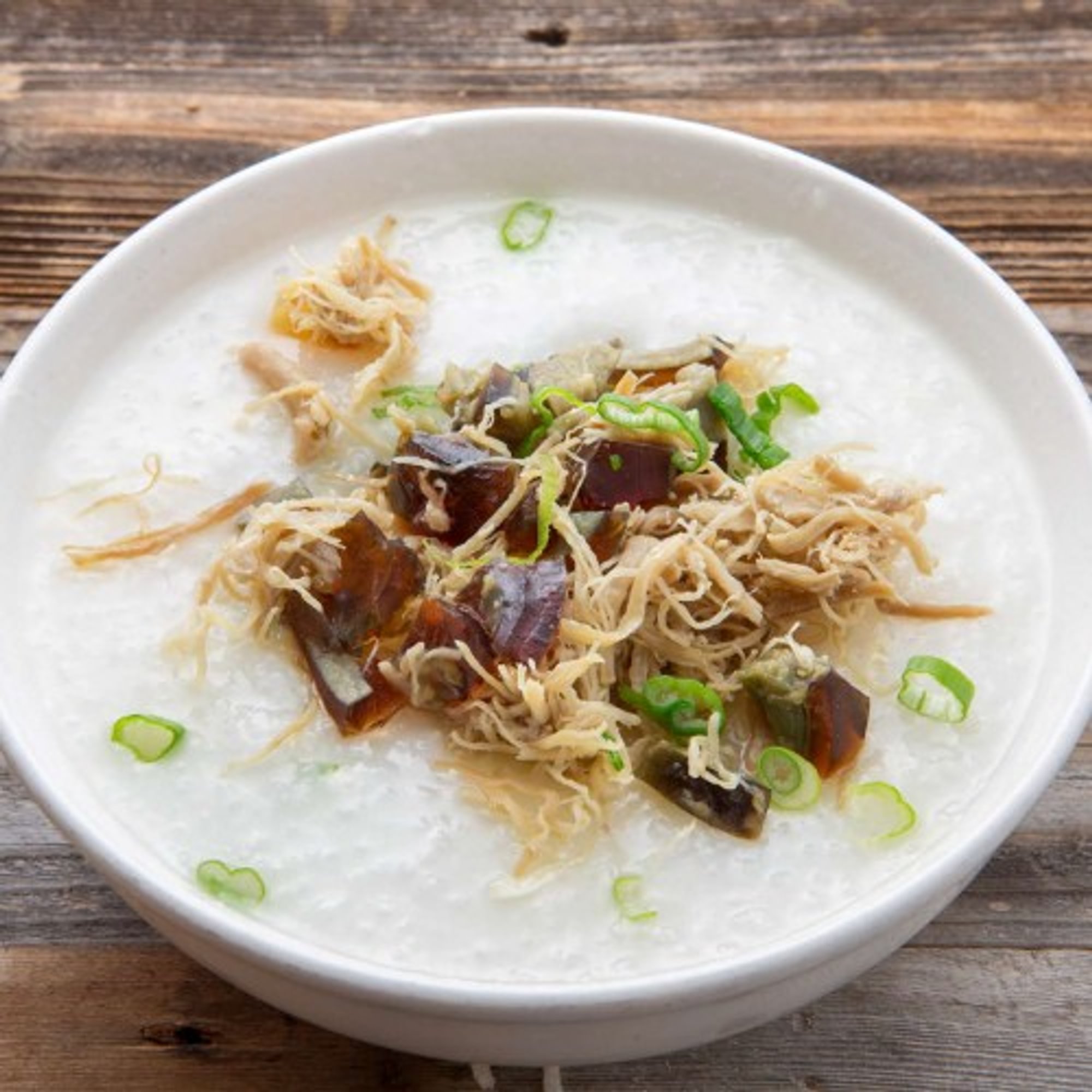 C52 Pork & Preserved Egg Congee 皮 蛋瘦肉粥
