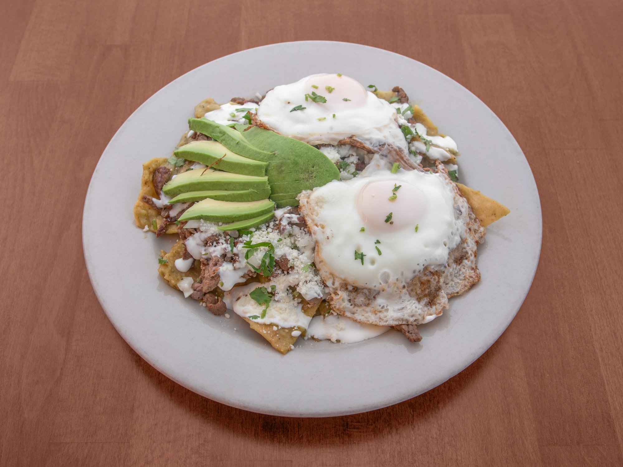 Chilaquiles Con Carne Y 2 Huevos Fritos / Chilaquiles with Meat and Two Fried Eggs