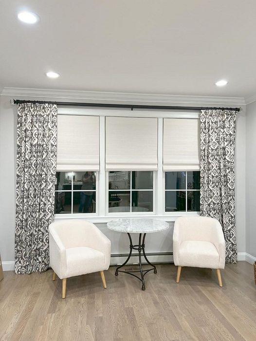 Totally obsessed with this look from our designers....white woven woods, lkat drapes & black hardware