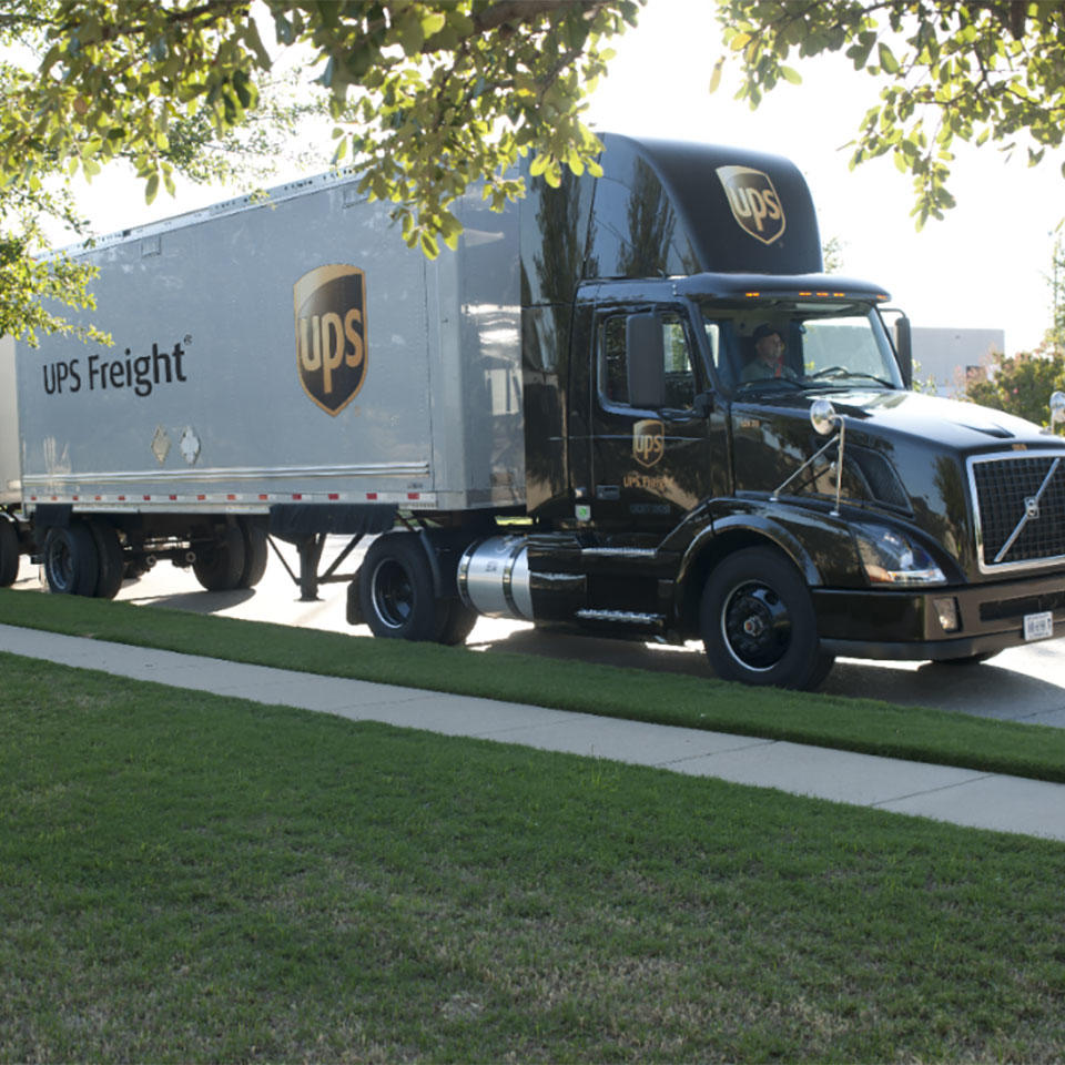 ups freight shipping semi-truck parked on the street