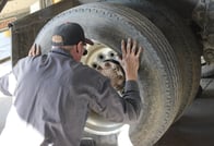 Tire and heavy-duty technicians complete dismount and mount on commercial tire. Tire and heavy-duty technicians complete dismount and mount on commercial tire.
