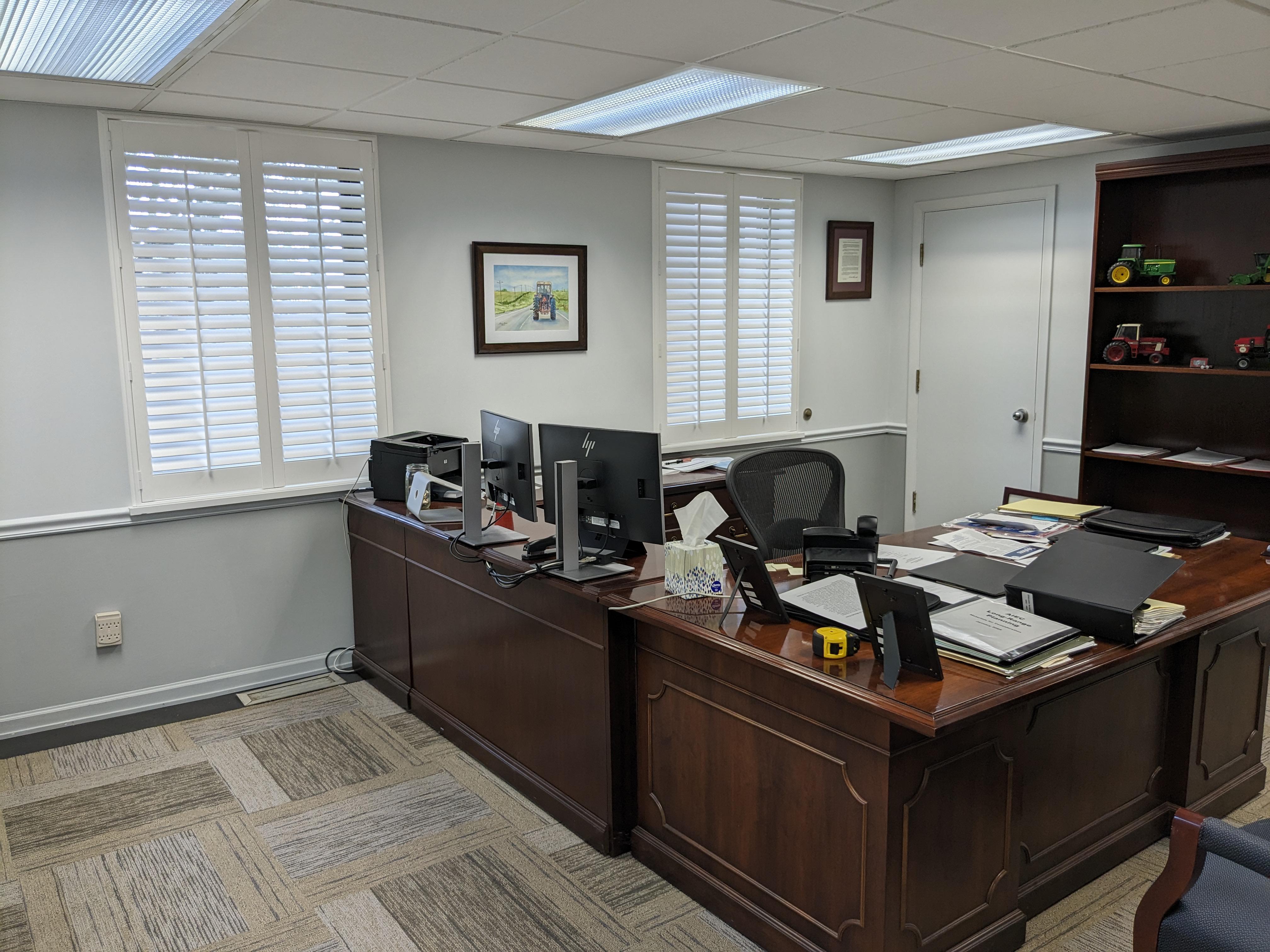 White shutters in Springfield Illinois office.  BudgetBlinds  WindowCoverings  Shutters