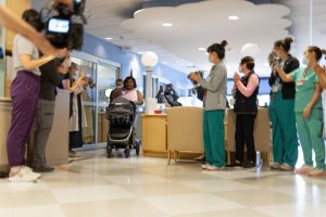 Alta Bates Summit NICU staff celebrate as mom and baby finally leave the hospital together.