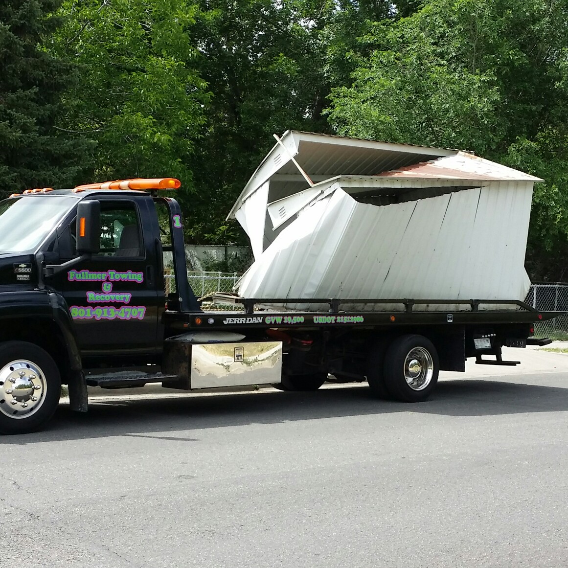 out hauling a junk shed. no job to big. 