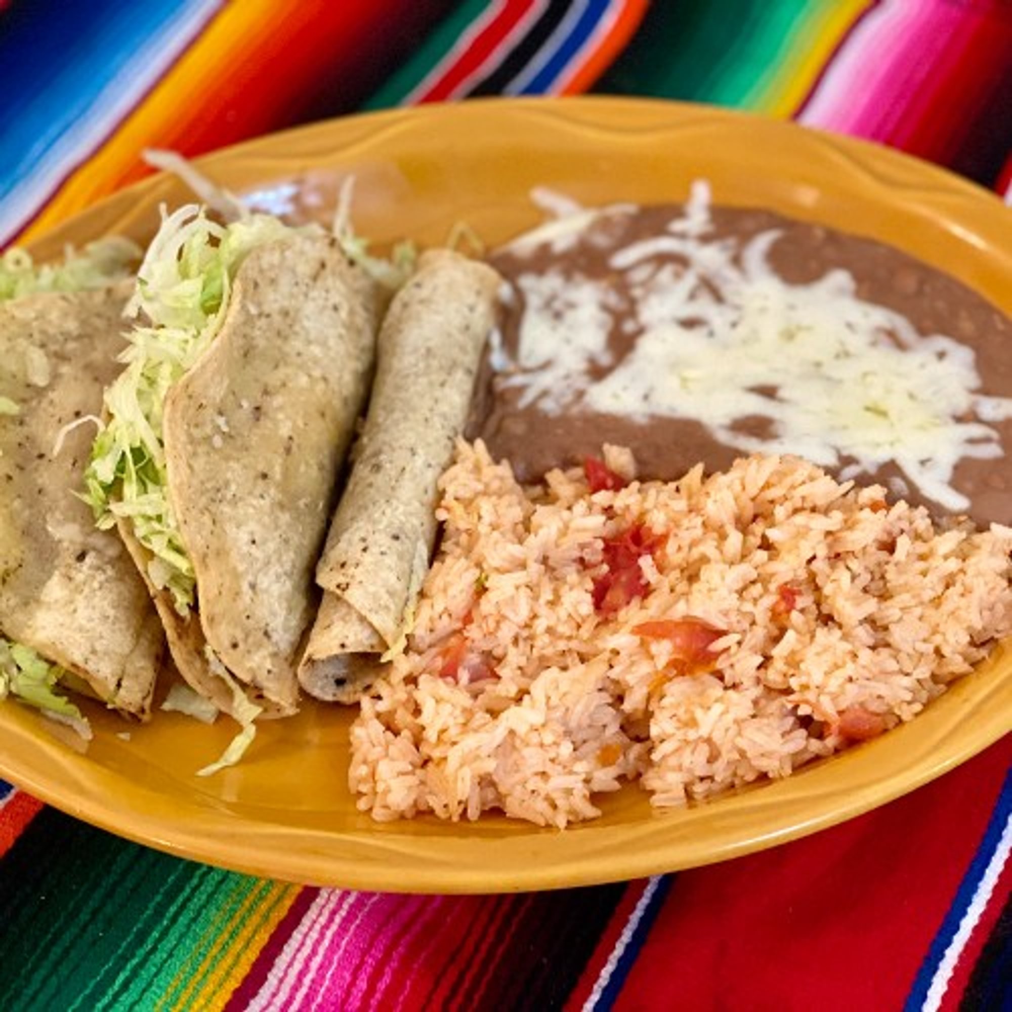 E. Two Rolled One Folded Taco Dinner
