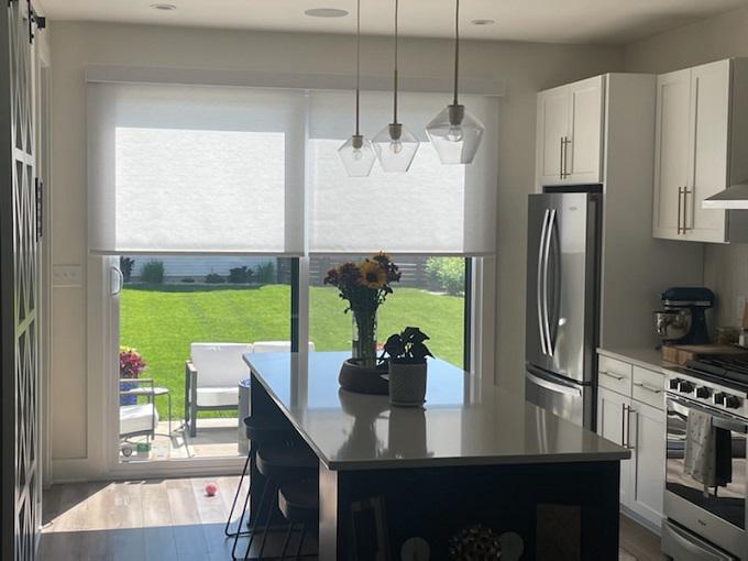 Got a bright, beautiful kitchen that gets just a little too bright sometimes? Here's an idea from Indianapolis! These sliding doors feature our Roller Shades to filter the light!  BudgetBlindsPlainfieldIN  IndianapolisIN  RollerShades  FreeConsultation  WindowWednesday