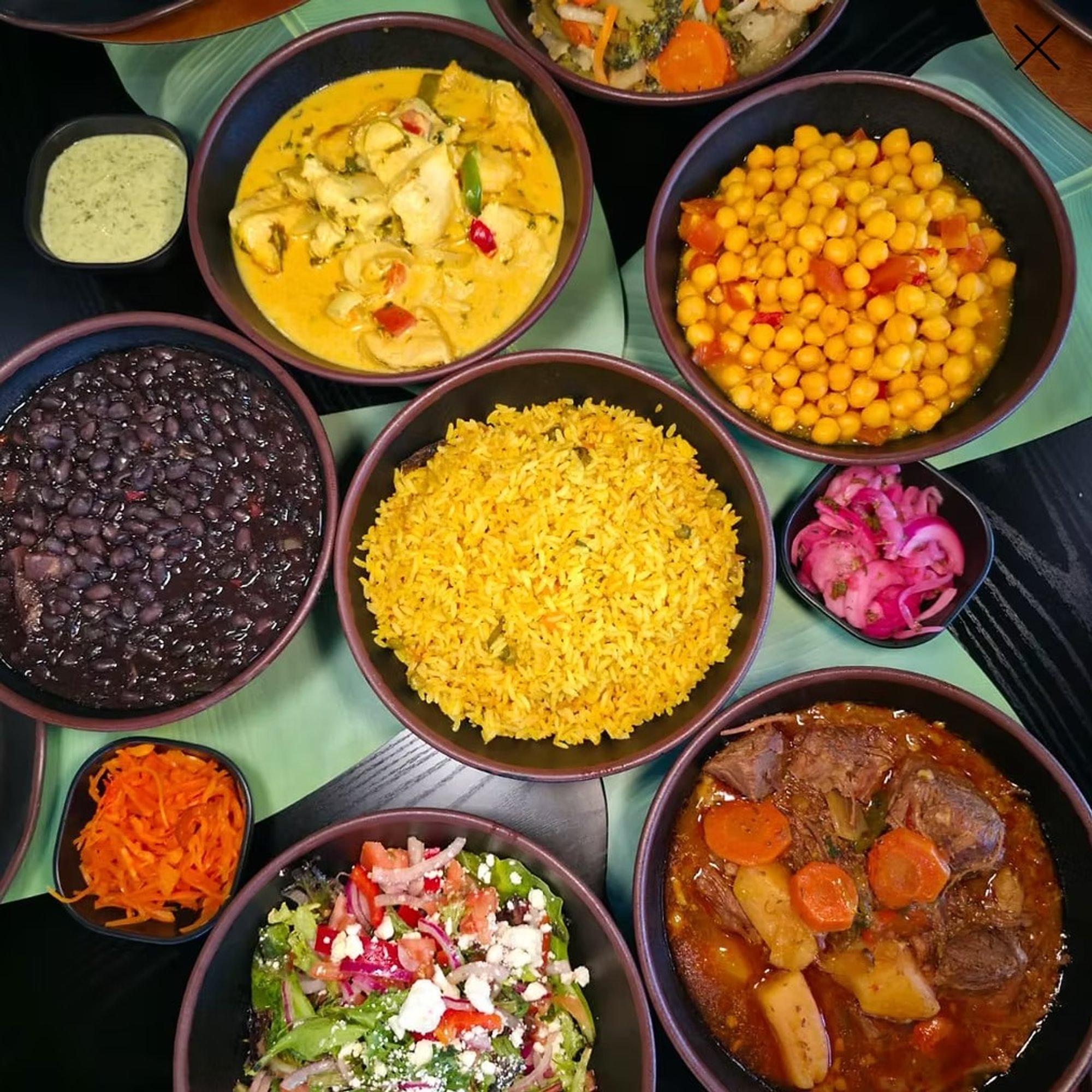 Deluxe Combo 2 Meats, 4 Sides & Rice