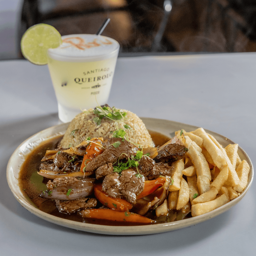 Cilantro Rice with Lomo Saltado - Beef Tenderloin.