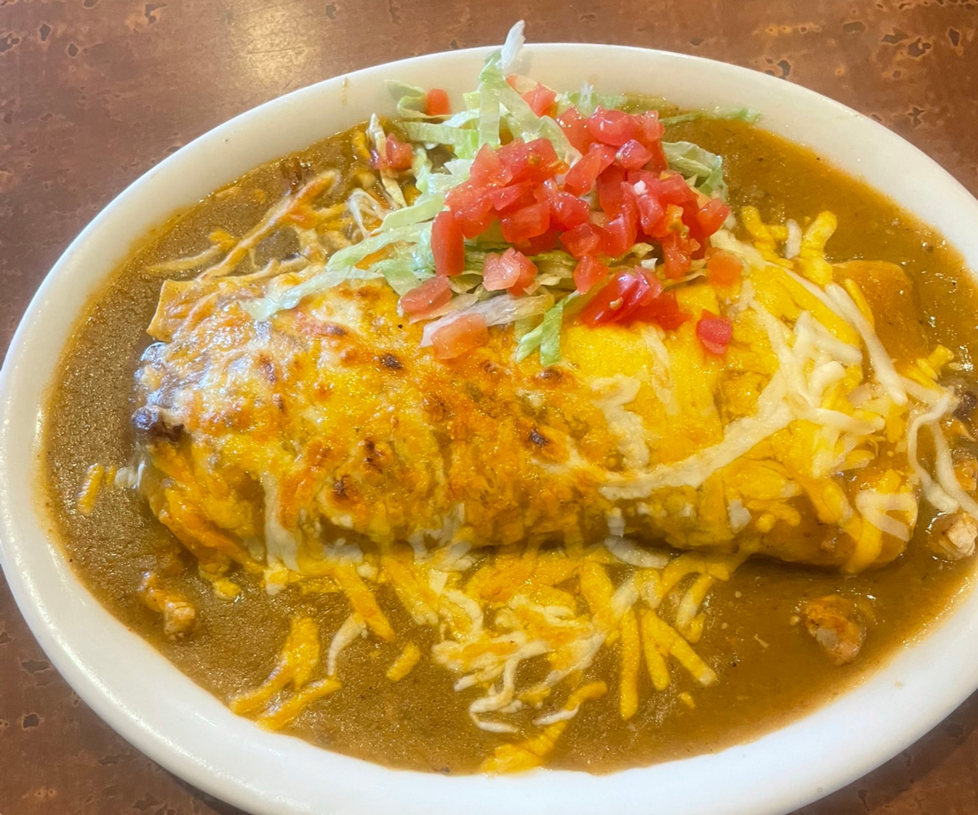 Shredded Chicken And Bean Burrito Smothered
