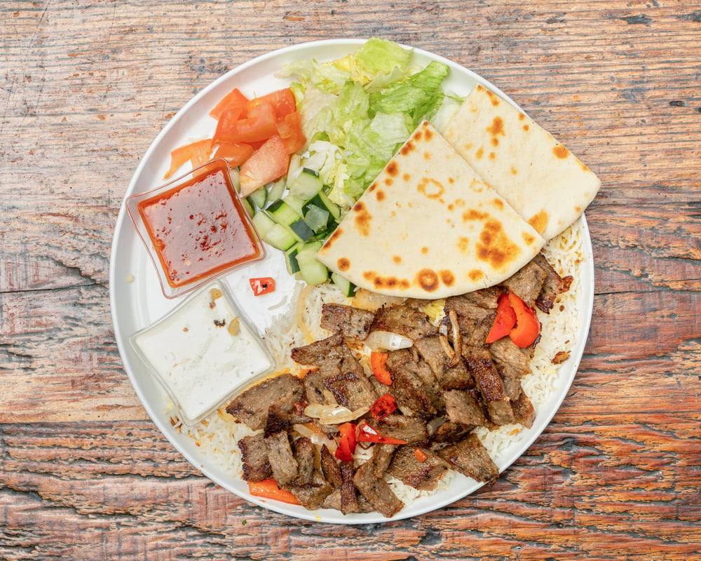 Plate (choose protein + rice + salad + pita )