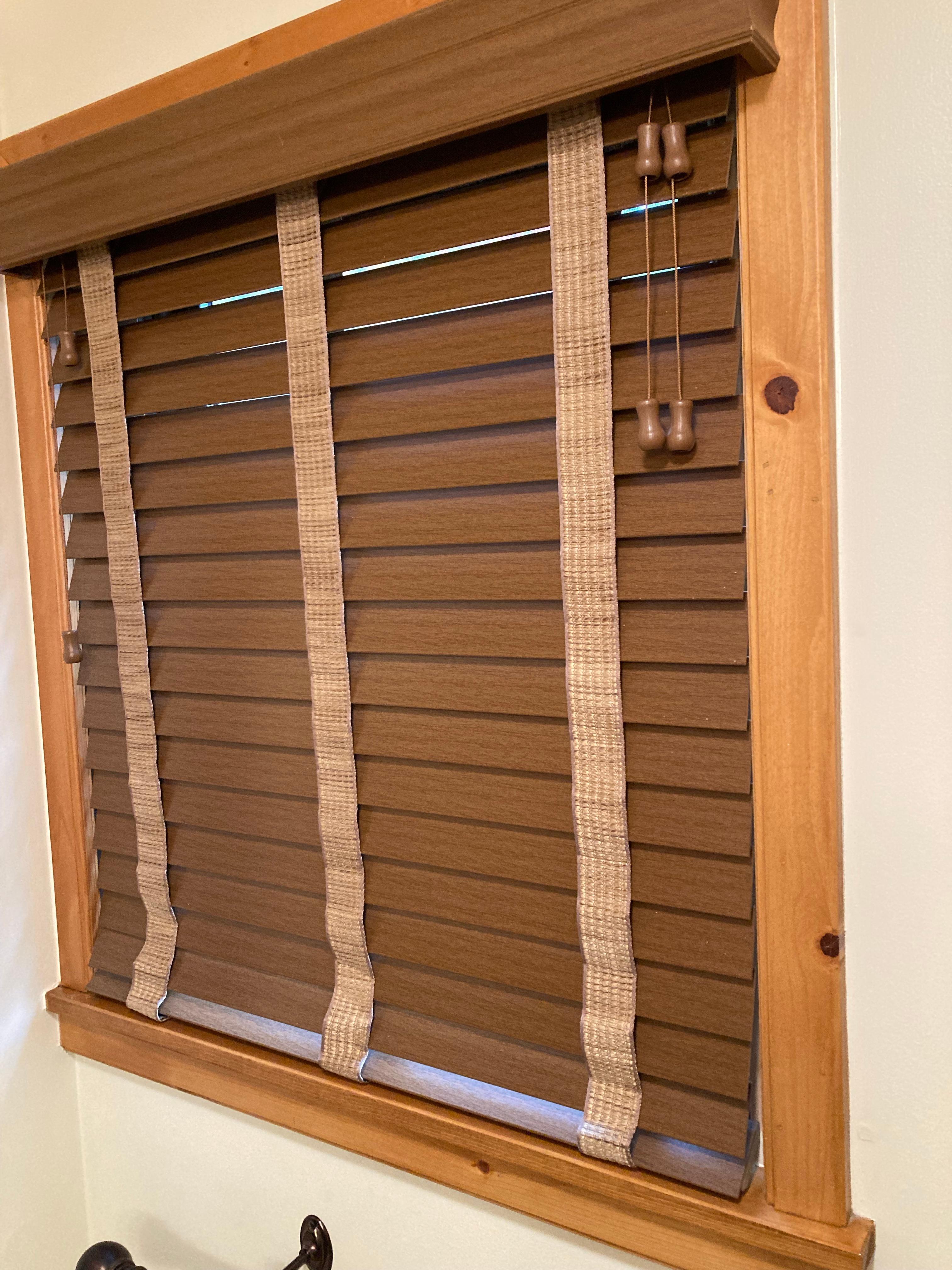 Horizontal wood blinds with decorative valance and tape