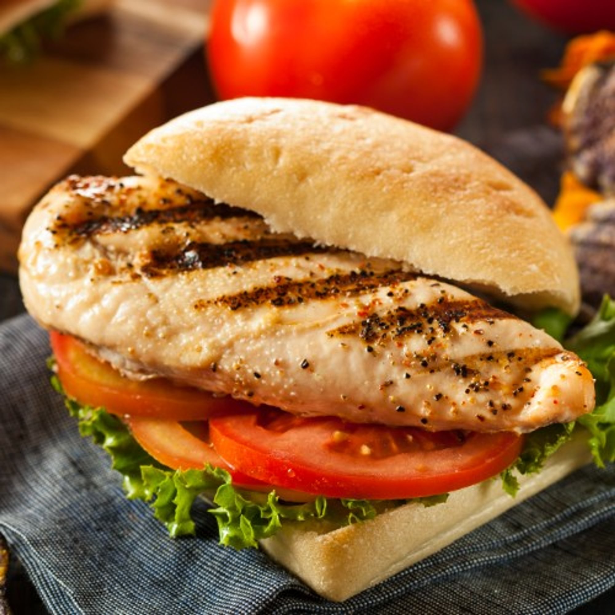 Grilled Chicken Breast Burger on a Bun with Fries