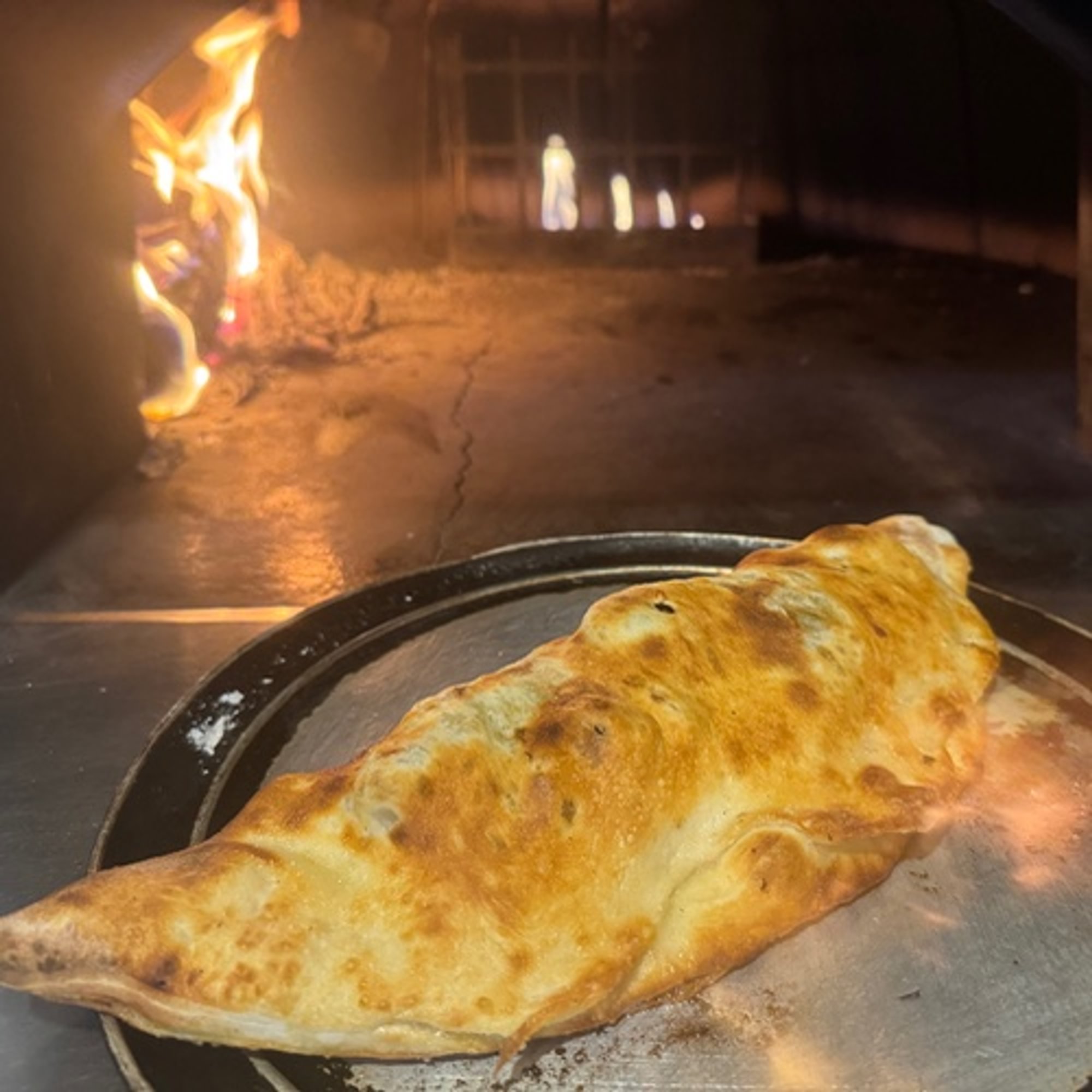 Sausage & Peppers with Mozzarella Calzone