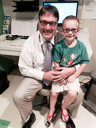 Dr. Richard Hertle diagnosed Hunter with accommodative estropia and a lazy eye and fit him with glasses. Dr. Richard Hertle diagnosed Hunter with accommodative estropia and a lazy eye and fit him with glasses.