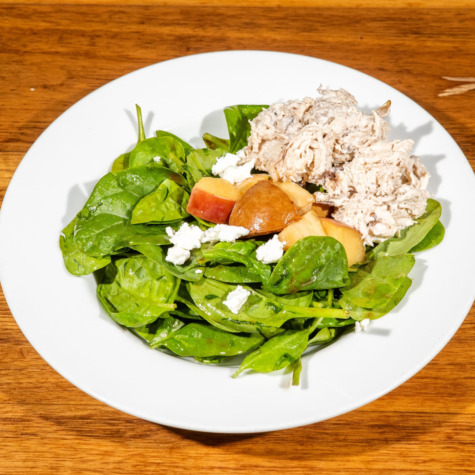 Tossed Organic Greens with Goat Cheese and Poached Pears Salad