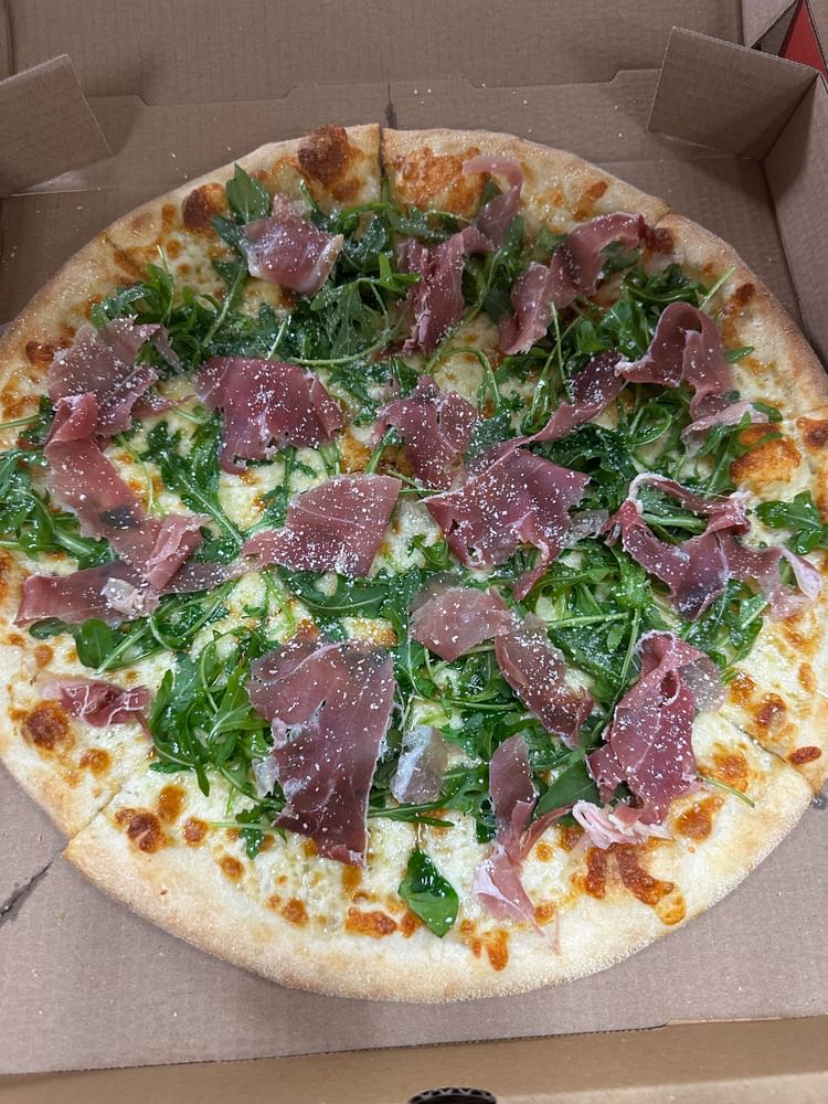 NY Style White Pizza - Topped with Arugula and Prosciutto