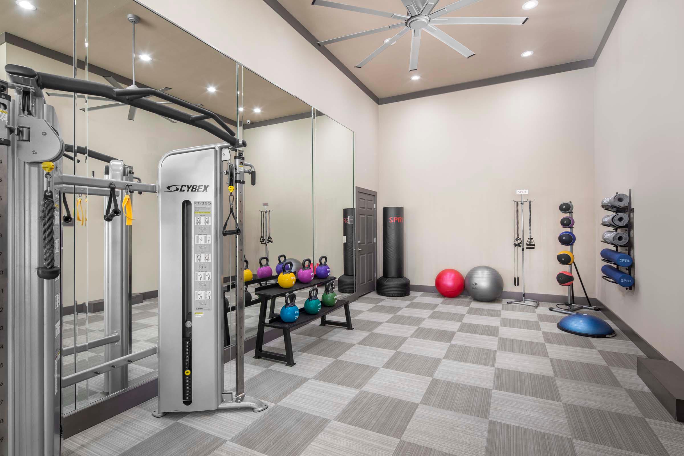 24-hour fitness center yoga area at Camden La Frontera