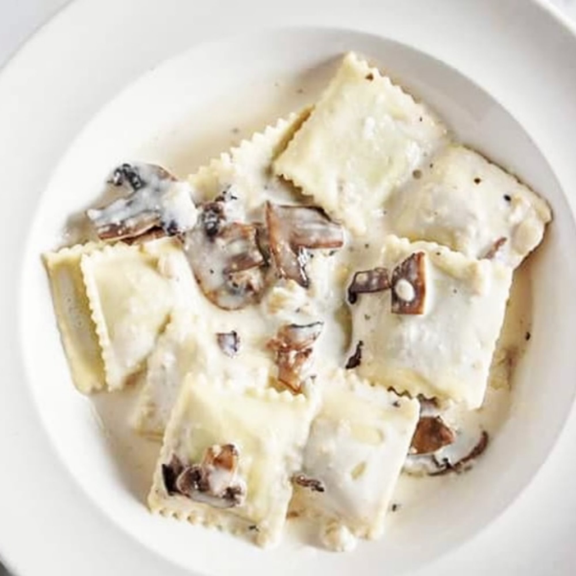 Porcini Mushroom Ravioli in Mushroom cream sauce