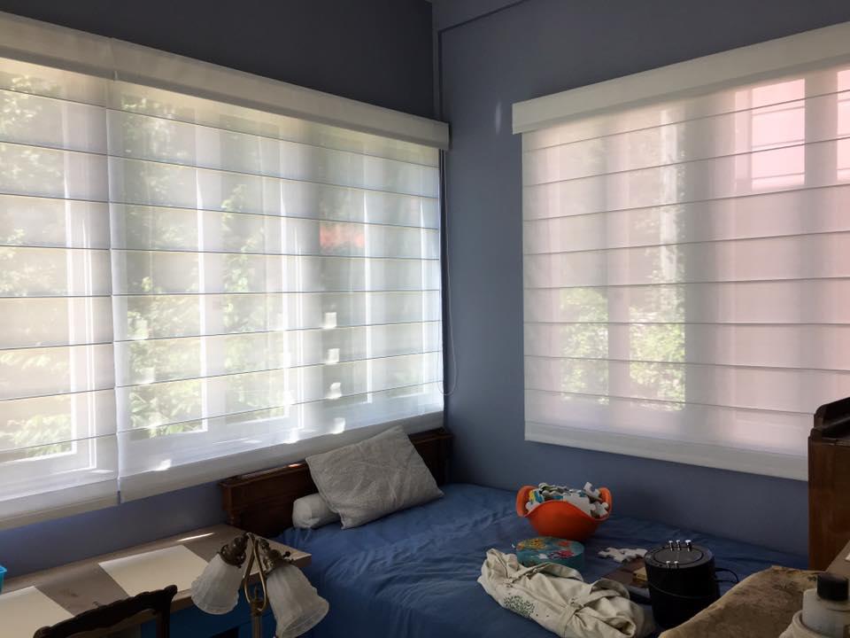 Solar shades fabricated as traditional roman shades offer a refreshing look to sun rooms and enclosed porches.