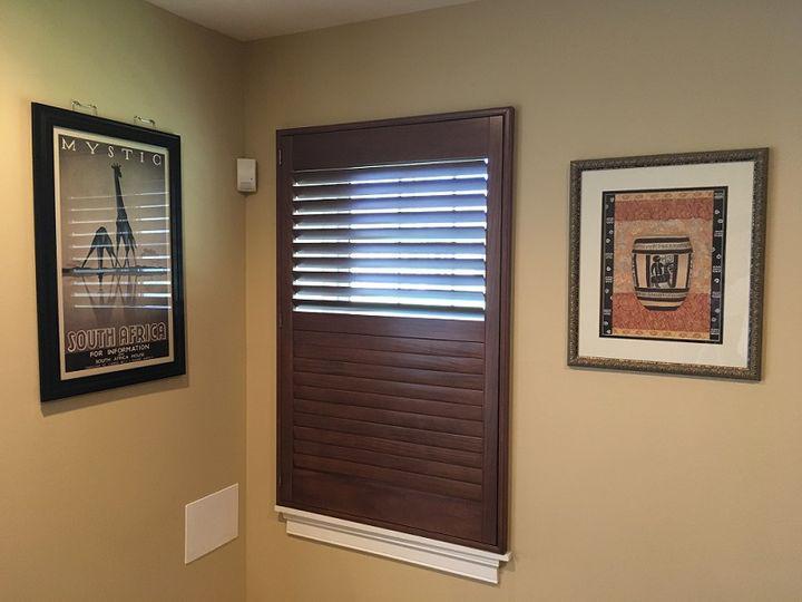 These Custom Interior Wood Shutters are totally custom - from the cutout for the doorknob to the rich wood stain, they're made to order....and yours can be too!  BudgetBlindsFairfax  WoodShutters  ShutterAtTheBeauty  FreeConsultation