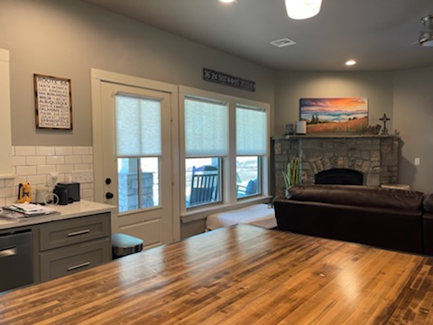 Our Motorized Roller Shades are ideal for areas with several or difficult-to-reach windows. They also enable simple remote control and seamless integration with your favorite smart home gadgets, as seen here in Claremore.
