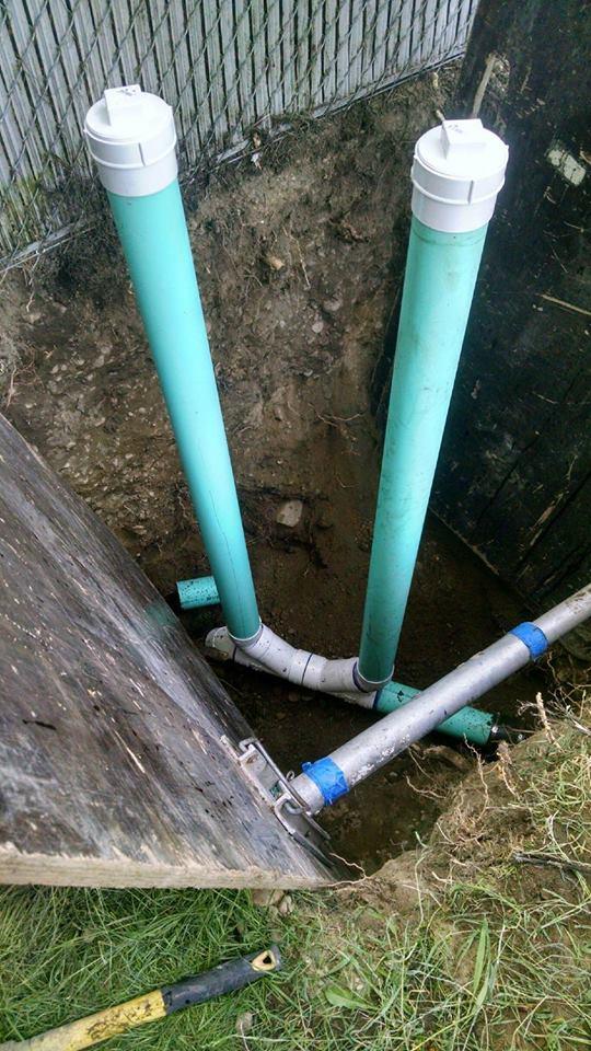 Sewer repair and two-way cleanout installation. The cleanout is installed this way so, in the event of a backup, you can clear the drain in either direction - upstream or downstream.