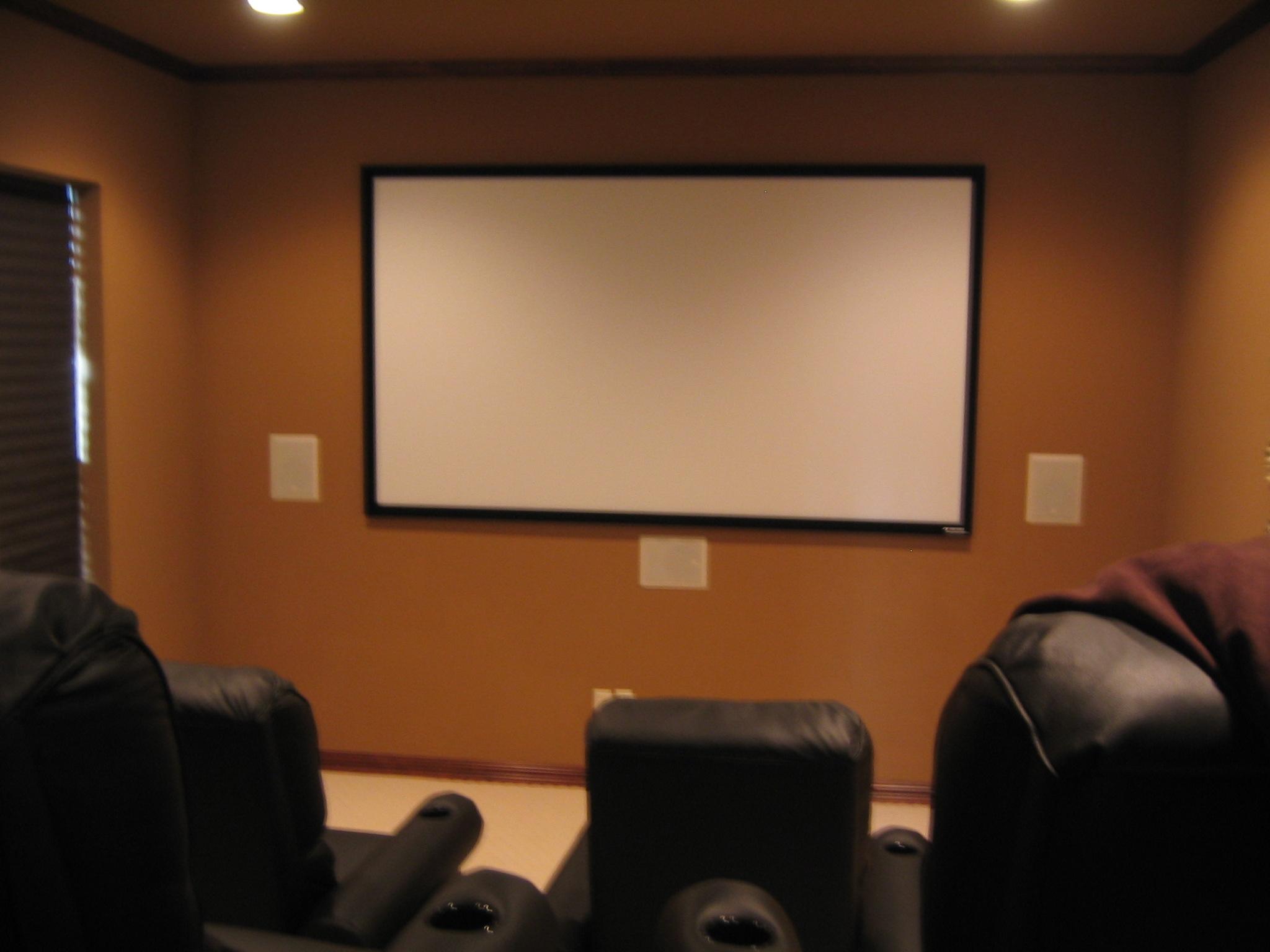 Klipsch RW-5802 In-wall speakers with a giant screen and projector.